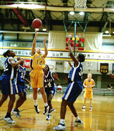 Melissa St. Mary goes up for a jump shot against Dillard in the Den.