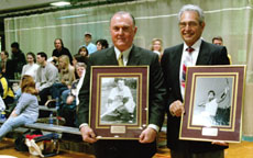 Butler Powell, B &60, and Roland Hymel, B &53, show off their plaques after being inducted as part of the 12th class into the Hall of Fame.