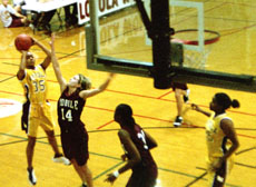 Stacia Jackson hangs in the air for a jumper against Mobile in the Den.  She was named to the GCAC All-Conference team.