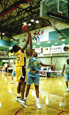 Rihana Galloway-Dawkins, general studies freshman, goes up for a shot in the lane against SUNO in the Den.