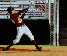 Brad Showalter, communications junior, swings at a pitch in Barrow Stadium.