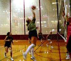 Marketing sophomore Shannon LaHaie jumps for the kill as the volleyball team practices in the Rec Plex.