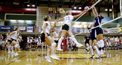 Shannon LaHaie, communications sophomore, follows through on a kill against Mississippi College in the Den.