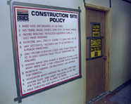 Warning signs hang outside the construction area for the new music business computer lab.