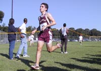 History junior Mike Gulotta races along the course at the Louisiana State University Invitational. He was one of only two Loyola students to run.