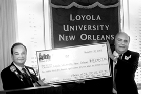 Ten classes of alumni from the Loyola Law School joined together to present the school with a check. The donation was part of the festivities of last weekend’s Law School reunion, which also included an induction ceremony for five law professors, a brunch and a concert.