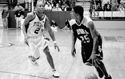 Chad Barnes, management sophomore, dribbles the ball agains the defense at Fogleman Arean against Tulane University.  The ’Pack went on to lose the game, but Barnes scored 20 points in the losing effort.