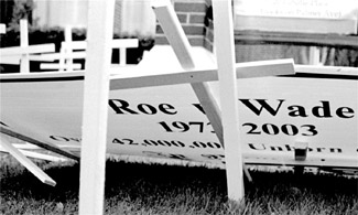 White crosses, as a symbol of protest, were placed in front of the Holy Name of Jesus Church for the thirty year anniversary of the Roe vs. Wade decision, which legalized abortion in America.