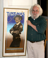 “Thorny” Penfield holds a piece of Tipitina’s artwork by Mike Smith. Penfield has hundreds of pieces of memorabilia from his time as an owner of Tipitina’s. 