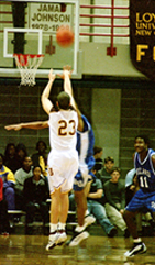 Pre-season All-Conference selection Chad Barnes launches a shot against Dillard.