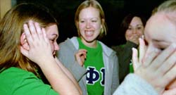 Rho Chi and forensic science junior Kristen Rivero, Gamma Phi Beta’s Emily Clark, English junior, Sarah Goodson, music business junior, and Courtney Becker, accounting sophomore, participate in the 2003 Bid Day activities. Bids from all of the on-campus sororities were given out on Monday, Jan. 13. This semester, 95 women recieved bids to join Loyola’s four sororities. Before bids are given out, the sororities hold four days of various parties, which include an open house and a philanthropy night, to allow the women to choose between the groups. The parties increase in length each day and the women are only allowed to visit with two organizations on the final day before bids. During the recruitment process, a certain number of current members become Rho Chi’s, who act as guidance counselors during the process. Rho Chi’s disaffiliate with their current sororities during the Fall semester and remain disaffiliated until after Bid Day.