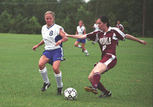 Music business sophomore Michaela Bono gains control of the ball during a game at the Â´Fly. The Wolfpack will take on Huntington College in Montgomery, Ala. tomorrow. 