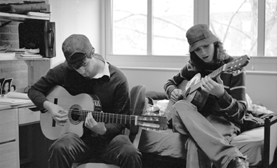 Thomas Farr (left) and Giovanini DeLa Rosa practice guitar is Biever Hall. Thomas was one of the original seven members in Natural State. 