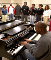 Genesis Gospel Choir rehearse in the choir room for a concert.