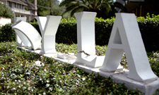 The "LOYOLA" sign at Calhoun and Freret sustains damage by vandals in early September. 