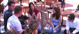 The group at P.J.Â´s Coffeeshop discusses everyday experiences of living in Israel.
