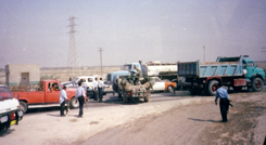 The Iraqi police attempt to direct traffic out of the road so that DoubledayÂ´s convoy can pass.