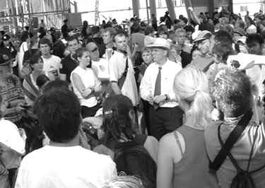 Loyola Law professor Bill Quigley in wide-brim hat gave legal counseling to protestors at the Republican National Convention in New York City.