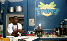 Jasmine Armstrong mans the counter at Café  Freret on Freret and Lowerline.