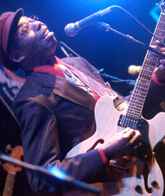 Walter Wolfman Washington wails on the guitar with the Roadmasters, as the opening act in TipitinaÂ´s blow-out anniversary concert.