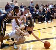 General studies freshman Luke Zumo dives for the ball on the floor Saturday in the Den against LSU-Shreveport. The Â´Pack defeated the 10th ranked Pilots 73-72. Zumo hit a 3-pointer late in the game that proved to be the game-winner.