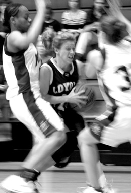 The Loyola womenÂ´s basketball team made the national tournament for the first time in school history. Despite a first-round loss, the Â´Pack had its best year led by senior Joelle Bordelon, above.