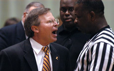 MenÂ´s basketball coach Michael Giorlando faces off with a referee over questionable officiating in the home game against LSU Shreveport Feb. 19. The Â´Pack beat the Pilots 73-72 to knock them out of 10th place in the NAIA. Giorlando said the energy of the fans that packed the Den motivated the team.