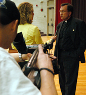 Sarah Miles St. Claire, a communications junior interviews the Rev. Kevin Wildes, S.J. before his lecture last Monday. Wildes kicked off the PresidentÂ´s Symposium on Bioethics last Monday.