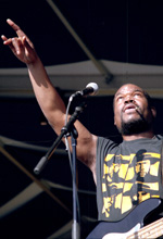 The Roots bassist Hub rocks out while on the Congo Square stage last Saturday night.