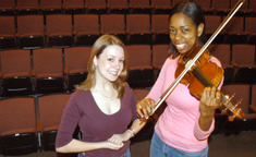 Kate Fleming, music performance senior, and Shana Bey, music performance junior, auditioned and were selected to perform solos with LoyolaÂ´s Symphony Orchestra this Sunday at 3 p.m in Roussel Hall.