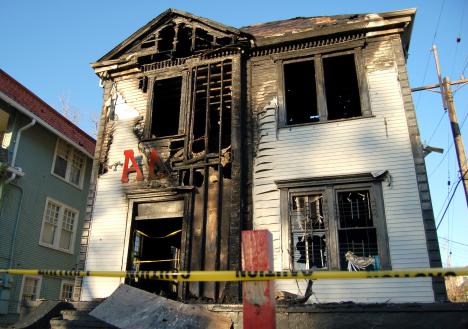 The ADG fraternity house, located at 7130 Freret St., is noticeably charred after a fire consumed the building on Wednesday morning.
