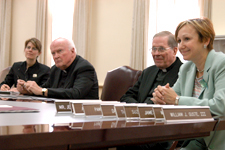 Kristine David Lelong, the Rev. William Byron, S.J., the Rev. James Bradley, S.J., and Donna Fraiche announce the Rev. Kevin Wildes, S.J. as Loyola's new president.  