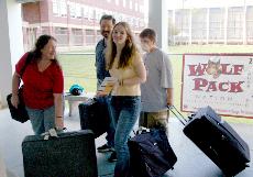 With on campus housing overflowing, freshmen took the first week to ease into the college dorm experience by having friends and family help move boxes and suitcases into dorms.