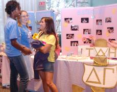 Omodesola Agbaje-Williams, Elizabeth Bogner and Juliana Zuniga await curious freshmen at sorority Open House.