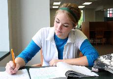 Brittany Cruickshank, business sophomore, studies for an exam in the Monroe Library.