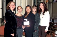 Members of the 2006 Bateman team hold one of the Silver Anvil awards they won at the PRSSA awards banquet on Nov. 16.