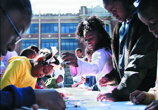Students from Good Shephard Elementary and Project C.A.R.E. paint and draw during the arts and crafts portion of the Wolves on the Prowl Day held Saturday, Nov. 4, on Loyolas campus.