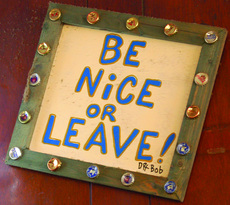 The St. Charles Tavern proudly displays local artist Dr. Bobs well-known welcome sign.