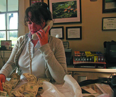 Stokes job at the Audubon Golf Course allows her to earn more than she was able to at her work study job.