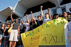 Loyola students stand in front of the Jena town hall building before the rally in support of the "Jena Six" Sept. 20.