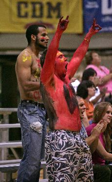 Colorful Pack fans, Brandon Sutton and Colby Lemaster, theater arts juniors cheered on a rallying Pack. 