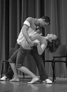 Ben Murrie acts out a scene with fellow actor Courtney Abbott at "Sex Signals," a production hosted by Loyola Sept. 10.