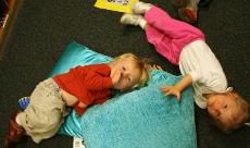 Two children play as nap time looms near at the Whelan Child Care Center near Mercy Hall. The nationally accredited center- popular among Loyola faculty and staff - has a waiting list of 175 names of parents wanting to enroll their children there.