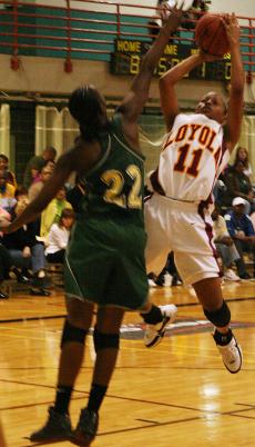 Management sophomore Trenese Smith shoots against Belhaven on Jan. 5 with 35 points, she tied a school record.