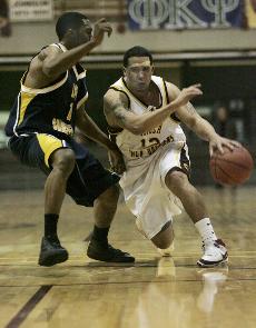 Driving to the hole, history sophomore Torry Beaulieu fights for Loyola's survival against LSU-Shreveport on Jan.3.