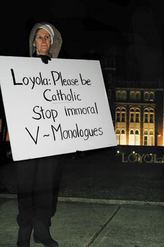 A woman shows distaste for Loyola's production of "The Vagina Monologues." A group gathered in 'prayerful protest' March 4.