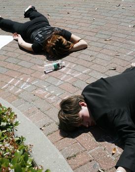 Students lie on ground in remembrance of lives lost in the Iraq war. This is the second annual Iraq war die-in on campus.