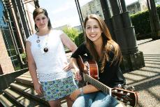 Ashleigh Alleman (left) and sister Aimee (right), of the folk band Ash, give readers an inside look at their Sister Act