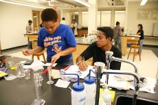 Alexi Gaddis, psychology freshman, and Daniel Patillo, biology sophomore, conduct paper chromatography experiments in the new Chopping Chemistry wing.