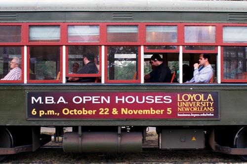St. Charles streetcar mo. 951 features an advertisement for the Loyola College of Business as it rolls past Audubon Park on Wednesday afternoon, Nov. 12.